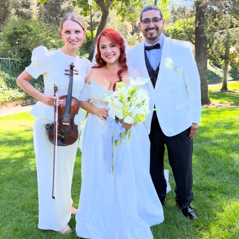 Mila with the newlyweds after the ceremony